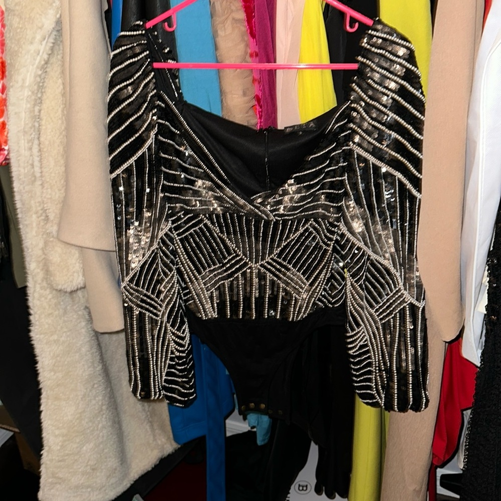 Seta Apparal sequin body suit is immaculate and sexy .. so much fun to wear